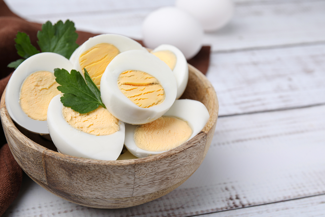 A bowl of freshly sliced hard boiled eggs