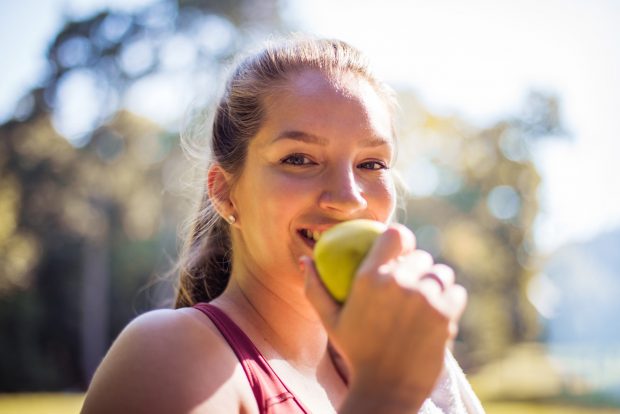 Eating a green apple