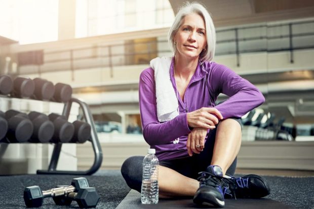 woman-sitting-menopause-1050x700